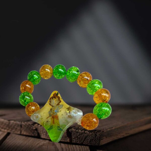 bracelet made from resin with Little Krishna sticker embedded for kids