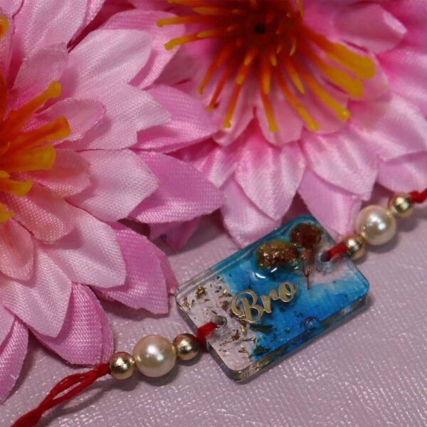 bro resin rakhi with flower blue